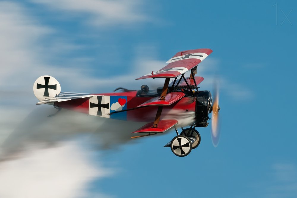 Vlucht met een historische rode drievleugelige zweefvliegtuig door Darek Siusta
