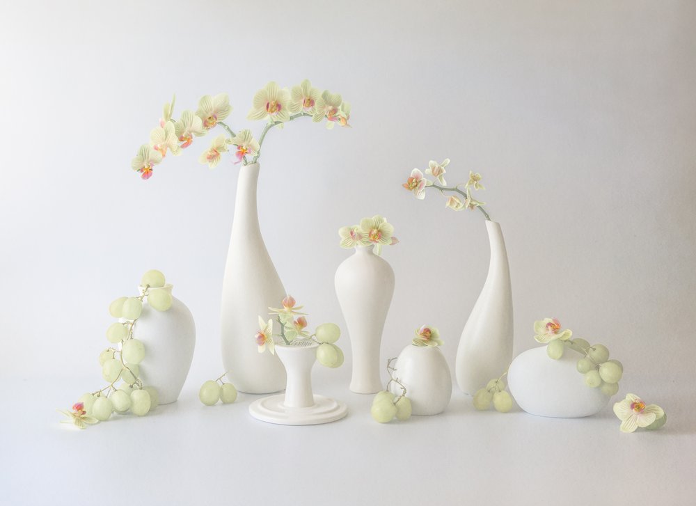 Rustgevend orchideeënarrangement door May G