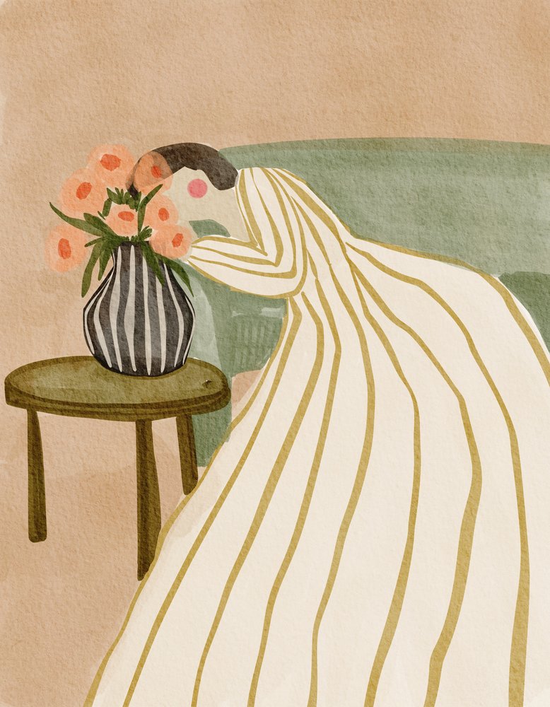 Vrouw die bloemen bewondert door Nikita Jariwala