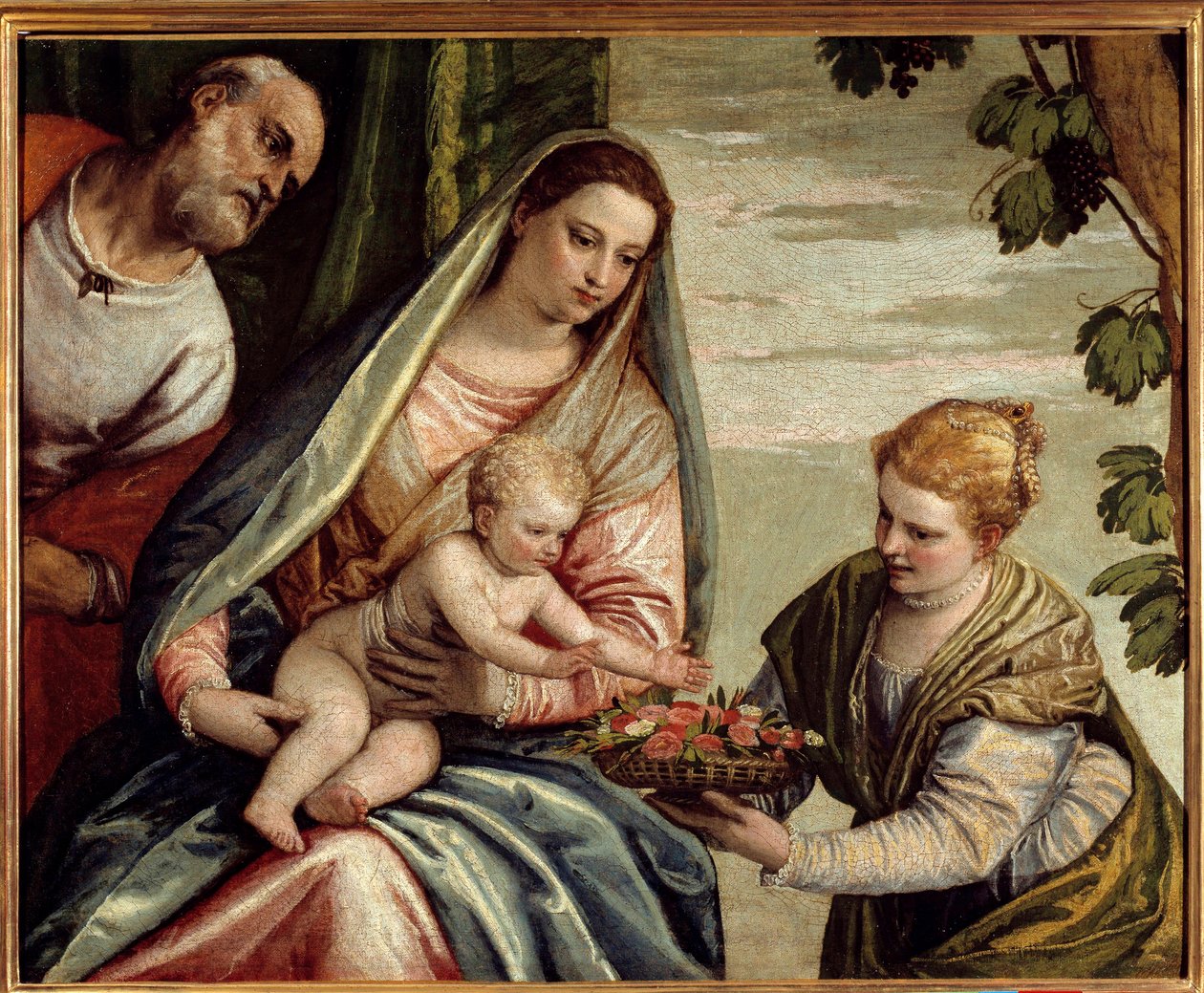 De Heilige Familie met een schenker (Sint Dorothea) door Veronese