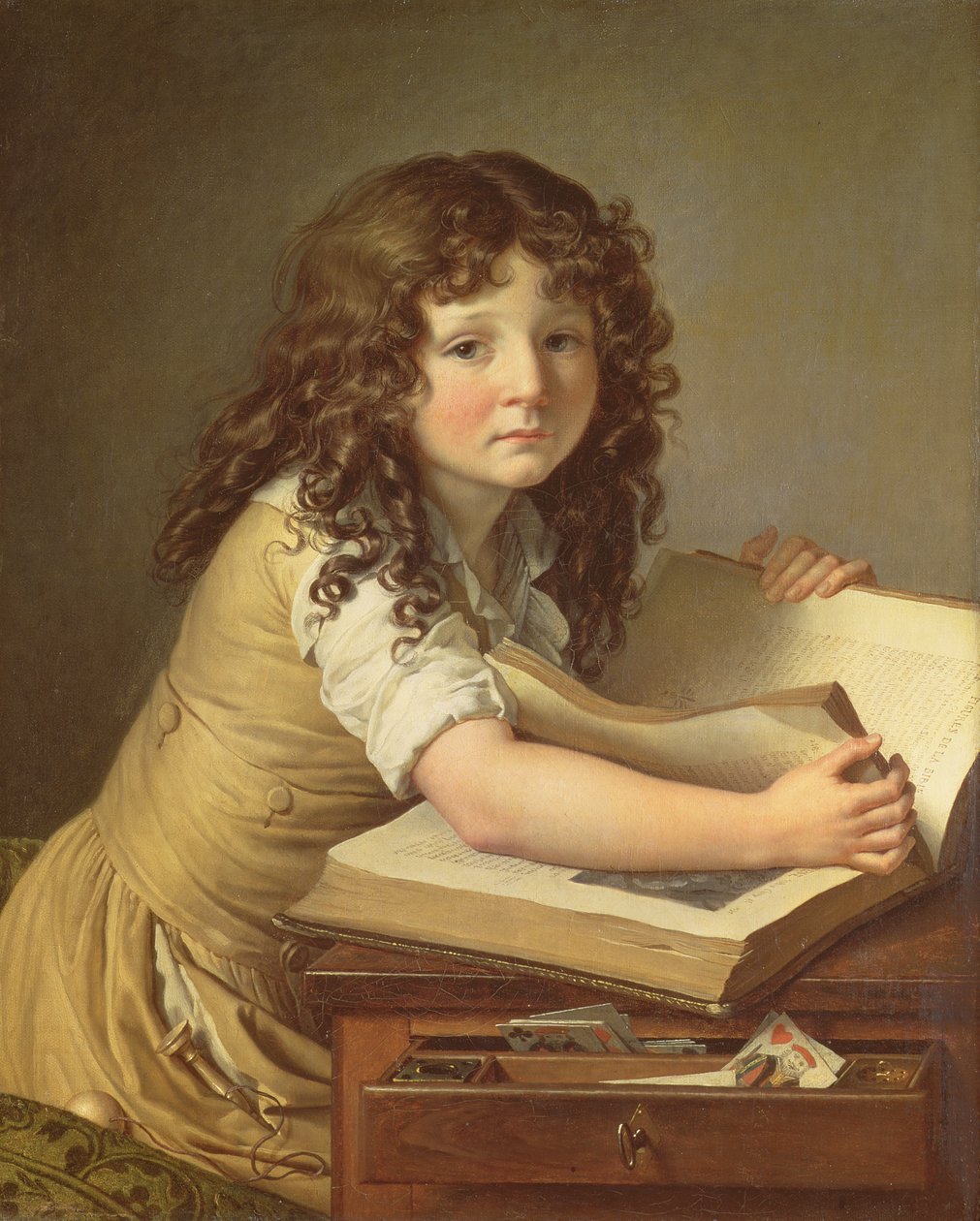 Een kind dat naar plaatjes in een boek kijkt door Anne Louis Girodet de Roucy Trioson