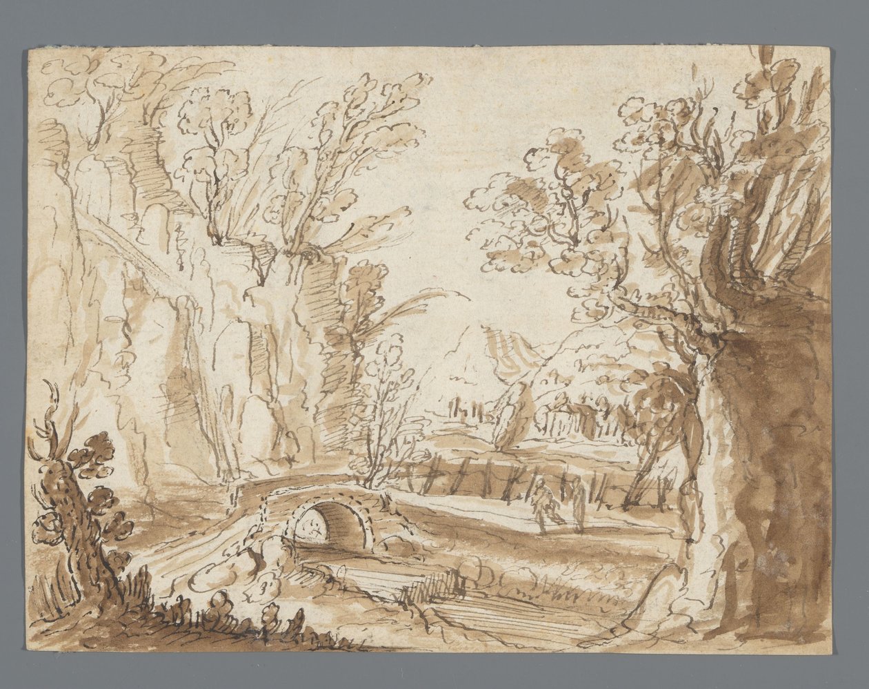 Landschap met twee figuren op een weg voor een stenen brug door Anonymous