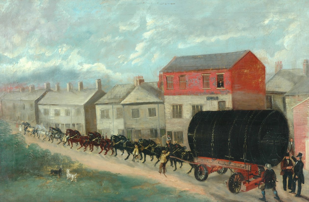 Een molenketel die op een wagen de heuvel op wordt vervoerd door British School