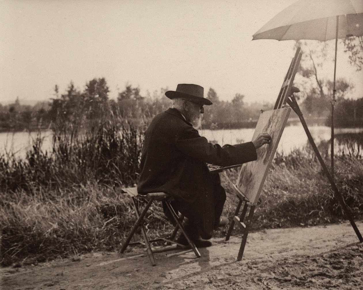 De schilder Lhermitte Léon (1844-1925), werkend aan de oever van de Marne, niet ver van zijn eigendom, circa 1914-1915, Frankrijk door Charles Lhermitte