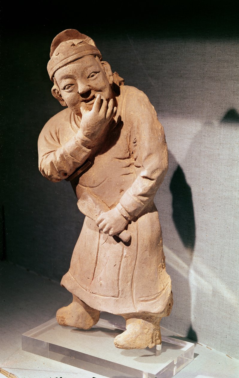 Beeldje van een fluitende acteur, uit Jiaozuo, Henan, Yuan-dynastie (1271-1368) door Chinese School