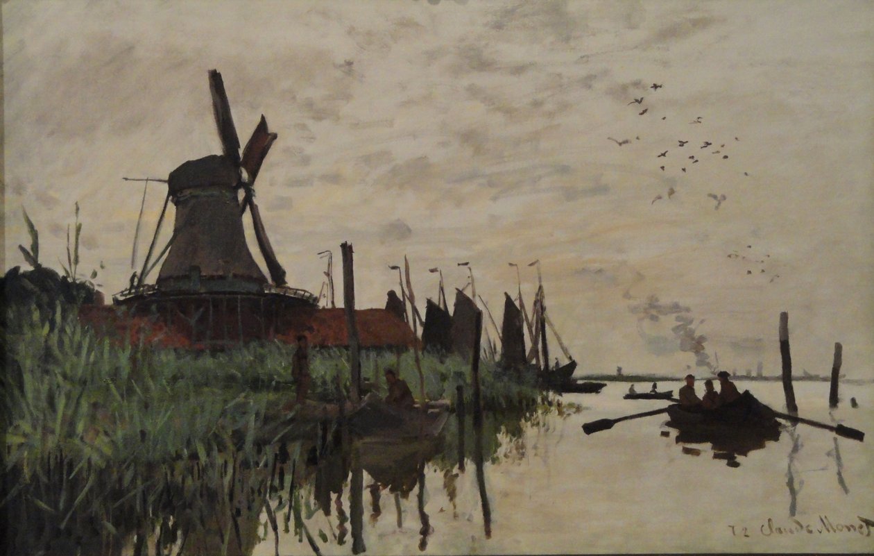 Molen en boten bij Zaandam, Nederland door Claude Monet