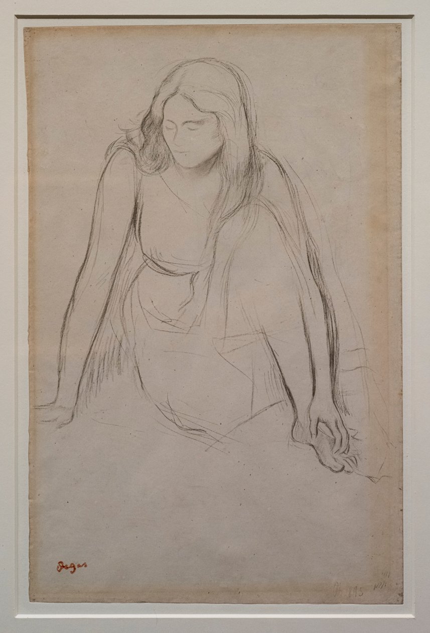 Vrouw zittend aan de waterkant. Rond 1867-1868. Zwart potlood op velijnpapier. door Edgar Degas