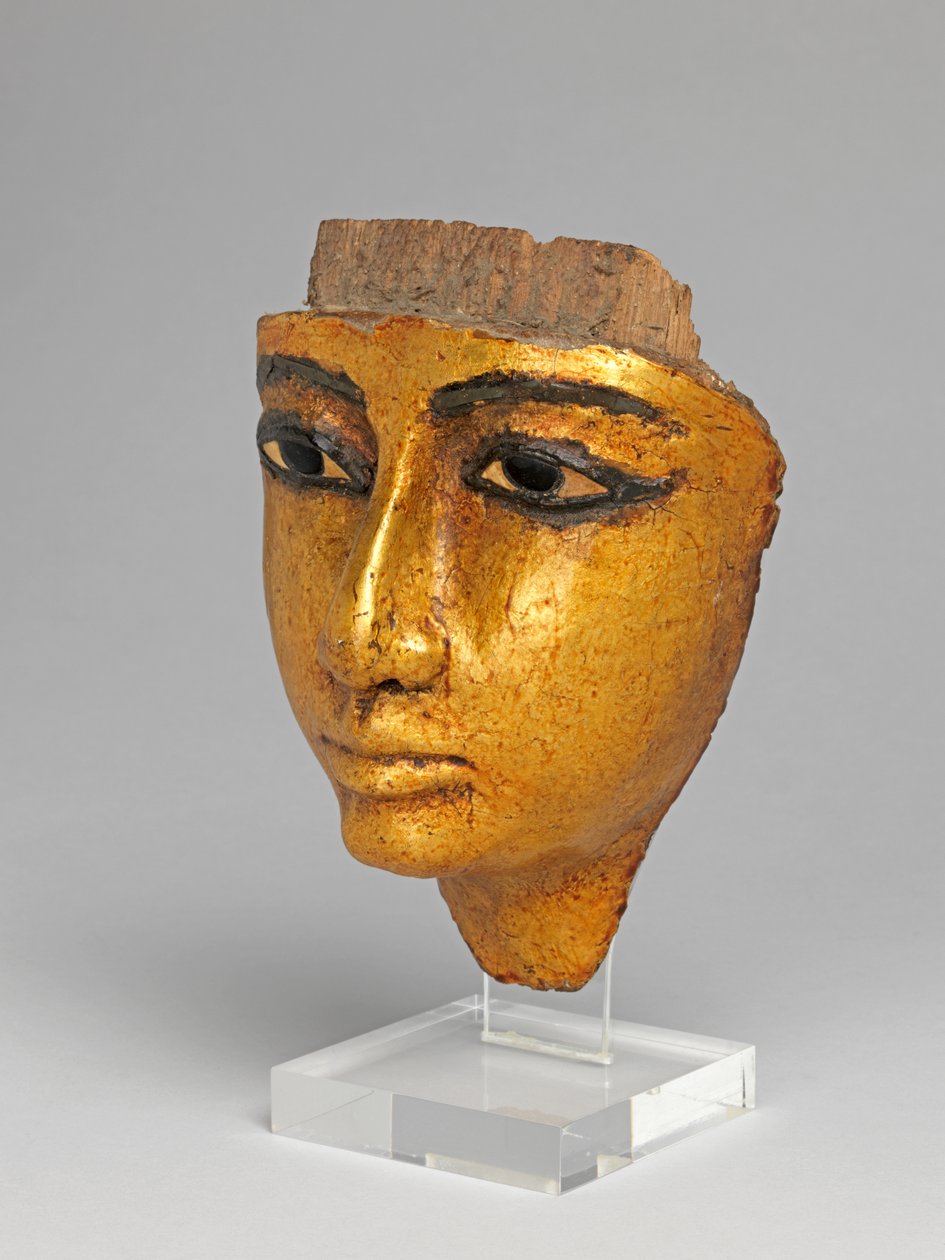 Gezicht van een kist, met ingelegde ogen en wenkbrauwen, verguld door Egyptian 20th Dynasty