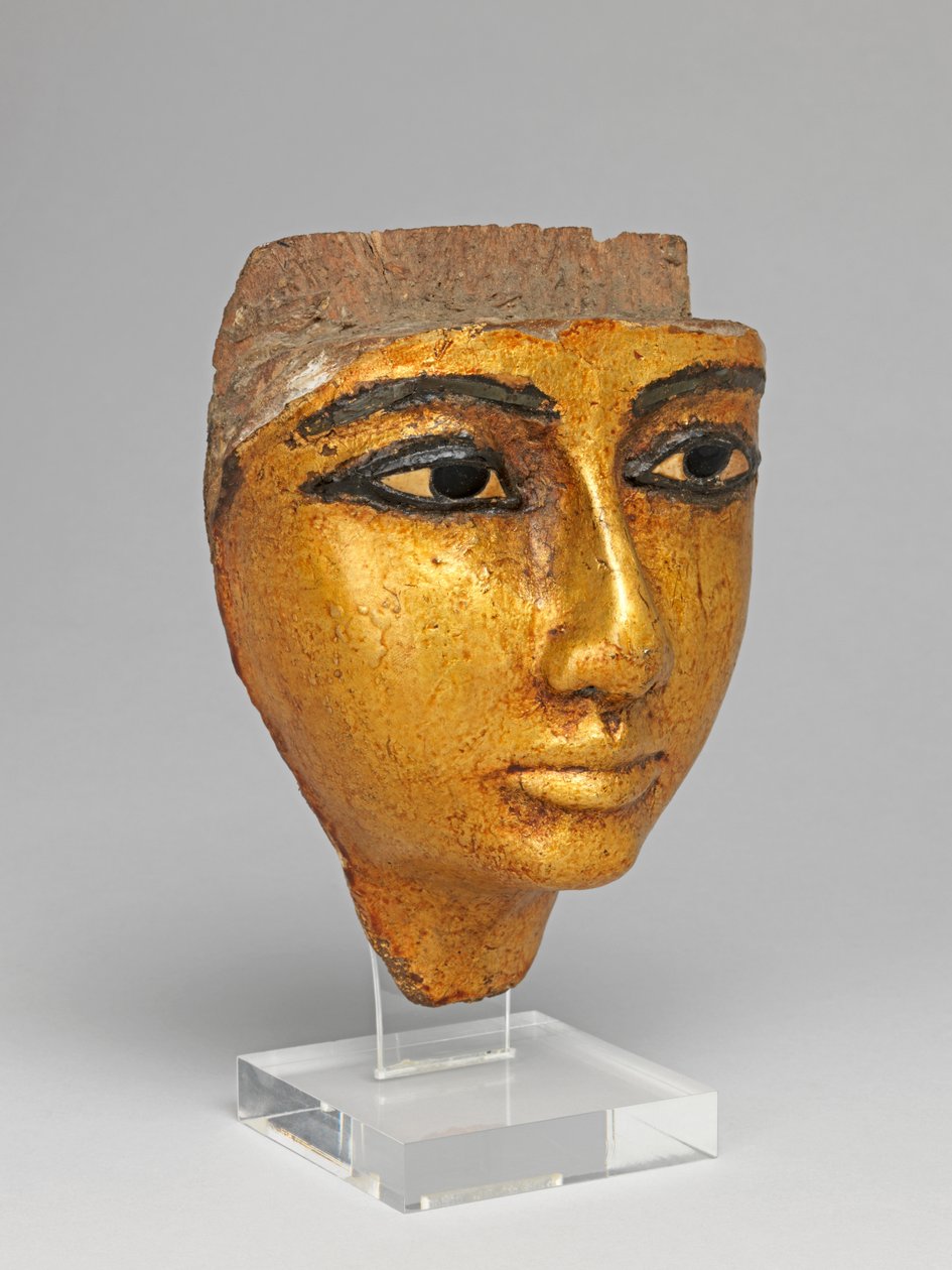 Gezicht van een kist, met ingelegde ogen en wenkbrauwen, verguld door Egyptian 20th Dynasty
