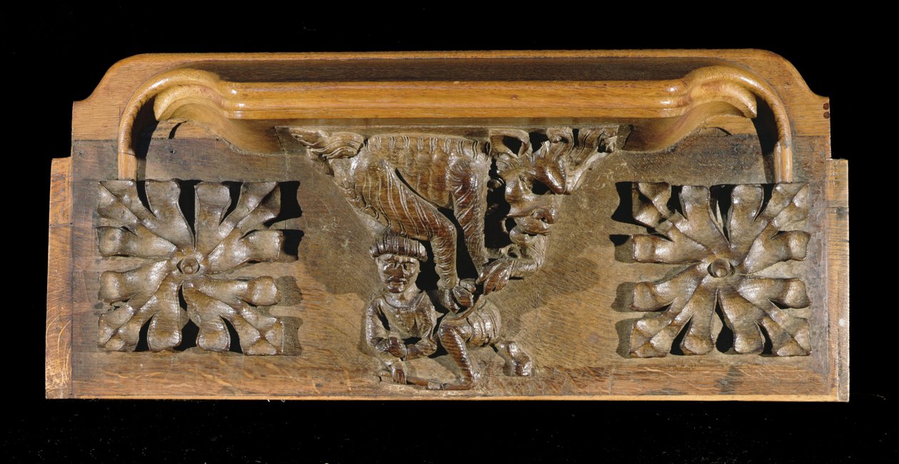 Een misericord die een kleine figuur met een pet toont, besprongen door een monster, New College Chapel, Oxford, laat 14e eeuw (hout) door English School