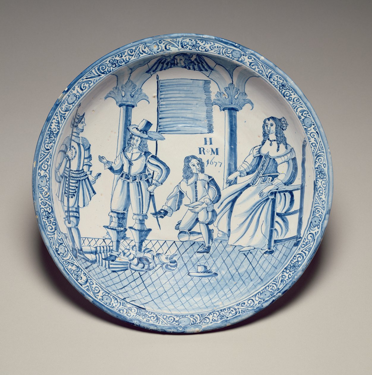 Schaal met koningin Catherine zittend terwijl een knielende ridder een schoen past, 1677 door English School