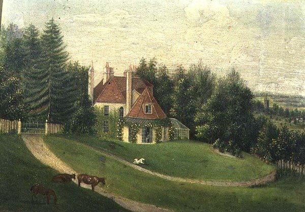 Uitzicht op een huis en een tuin door English School