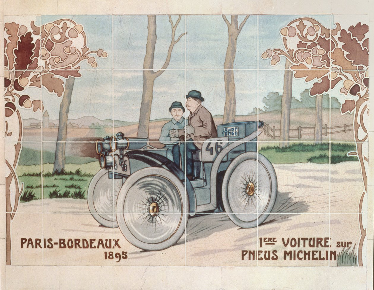 Edouard en Andre Michelin rijden in L