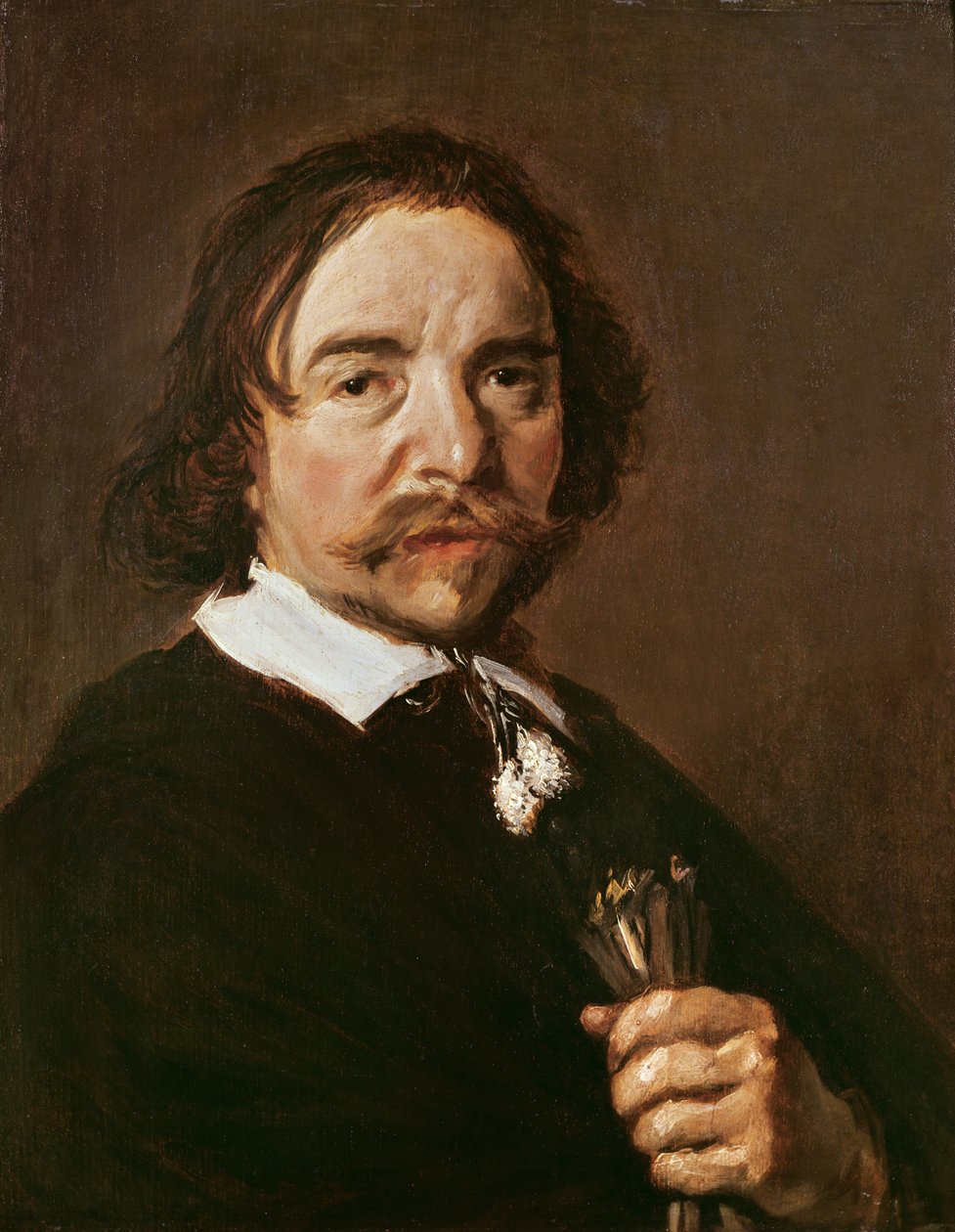 Portret van een man met een handschoen en zwart haar, c.1657 door Frans Hals