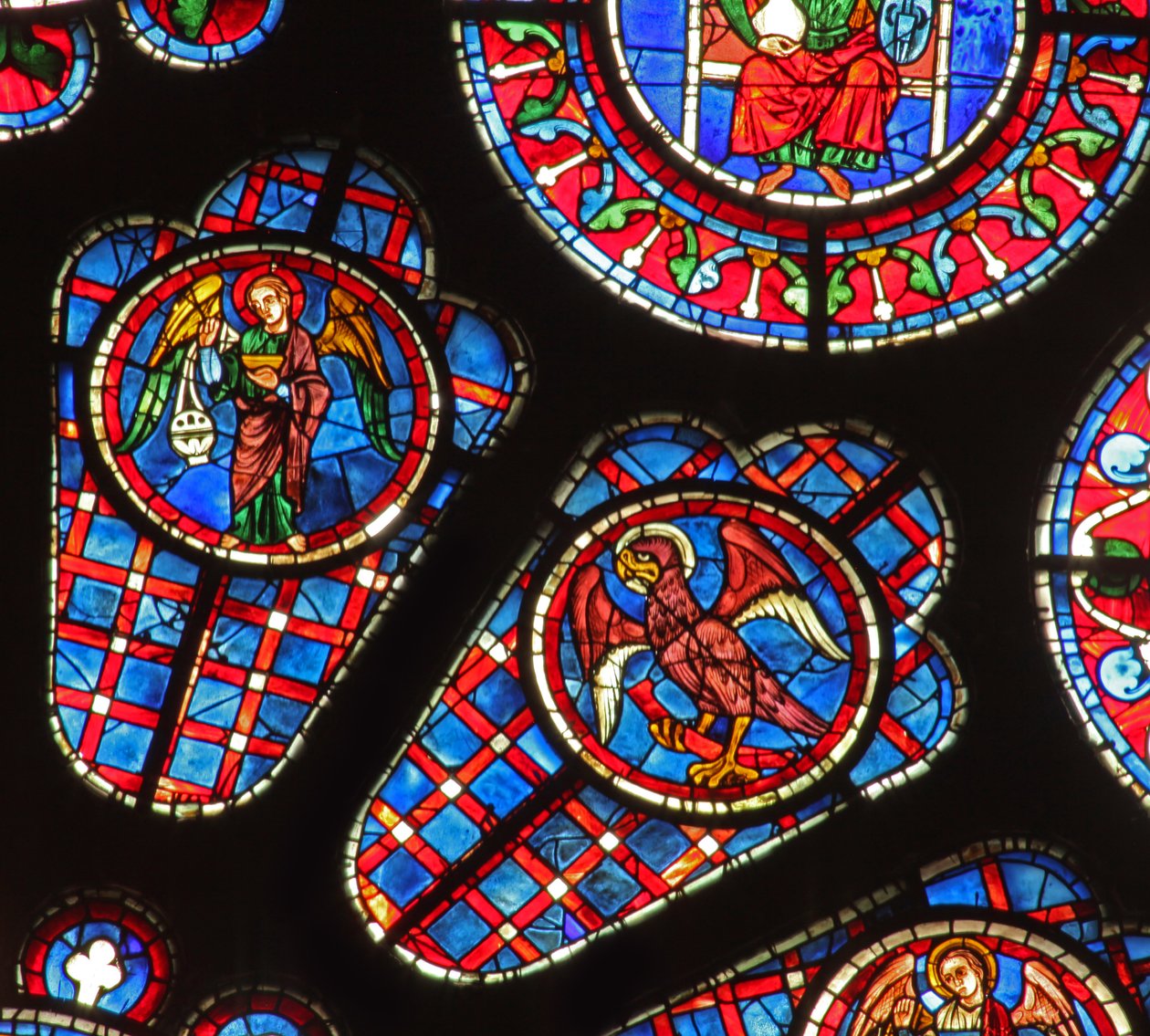 Een wierook zwaaiende engel en St. Johannes