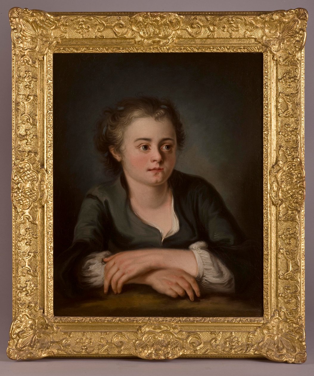 Portret van een jong meisje, gekleed in een groene jurk en witte chemise, zittend voor een tafel door French School
