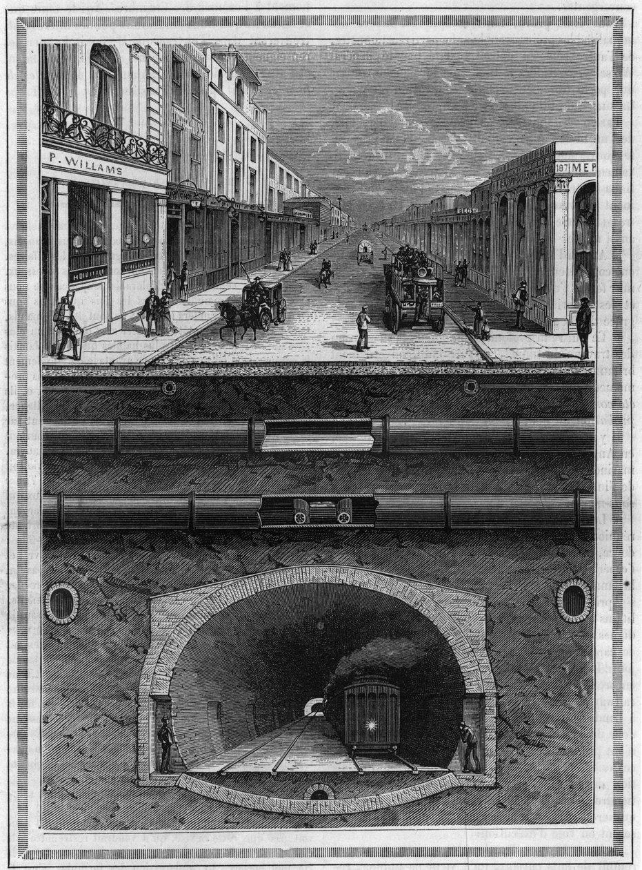 Wat er onder de bestrating van Londen (Groot-Brittannië) ligt: gasleiding, waterleiding, pneumatische buis voor afval, riolen, tunnel en spoorlijn voor stedelijke gebieden. Gravure in 