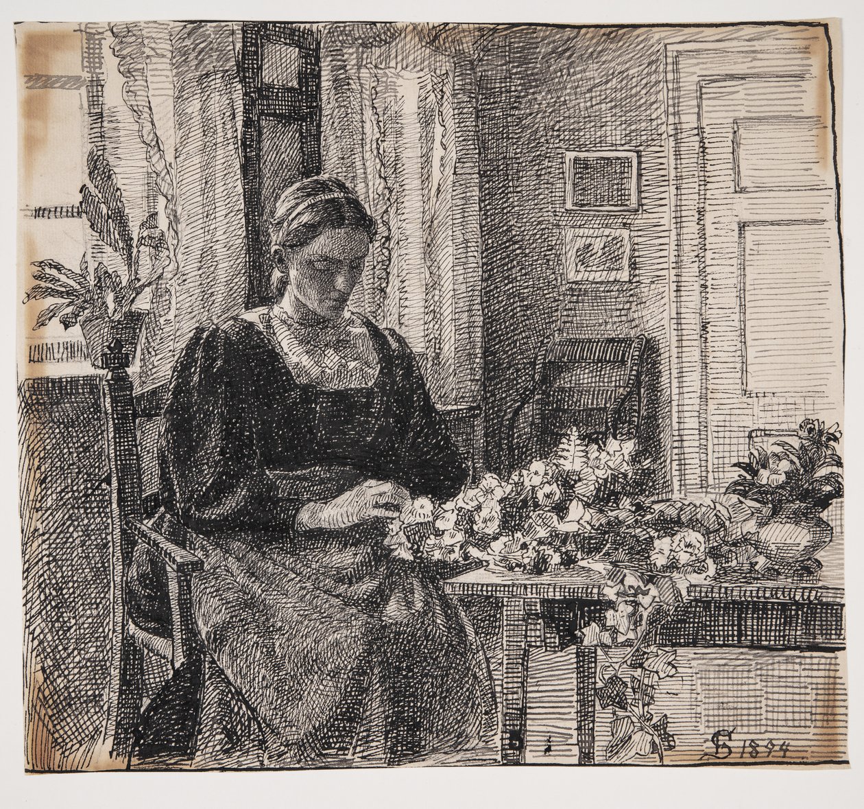 Mijn vrouw (mevrouw Anna Syberg) bindt een krans door Fritz Syberg