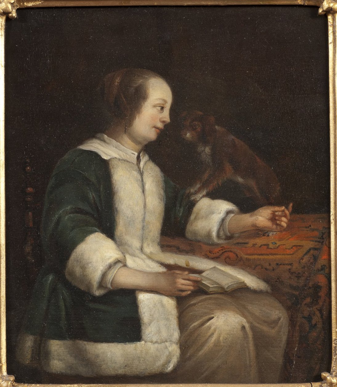 Portret van een dame met een hond door Gabriel Metsu