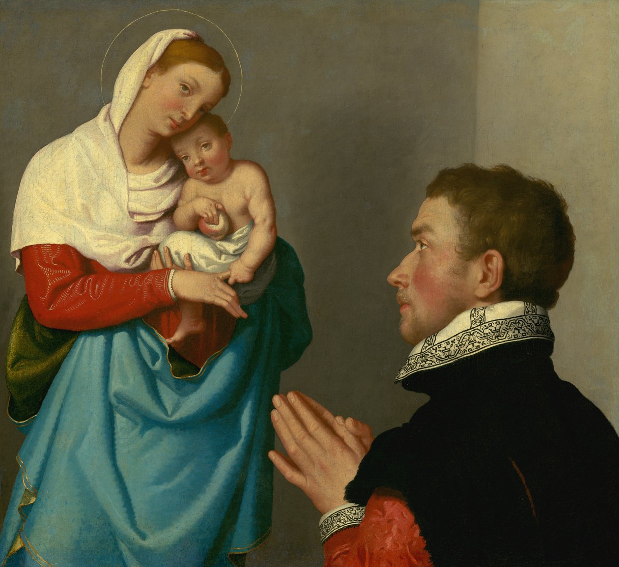 Een heer in aanbidding voor de Madonna door Giovanni Battista Moroni