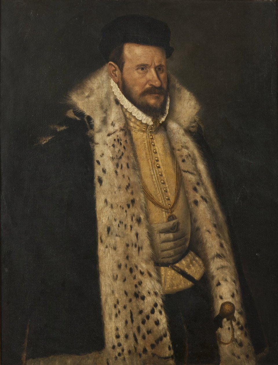 Portret van een man in een met bont gevoerde jas door Giovanni Battista Moroni