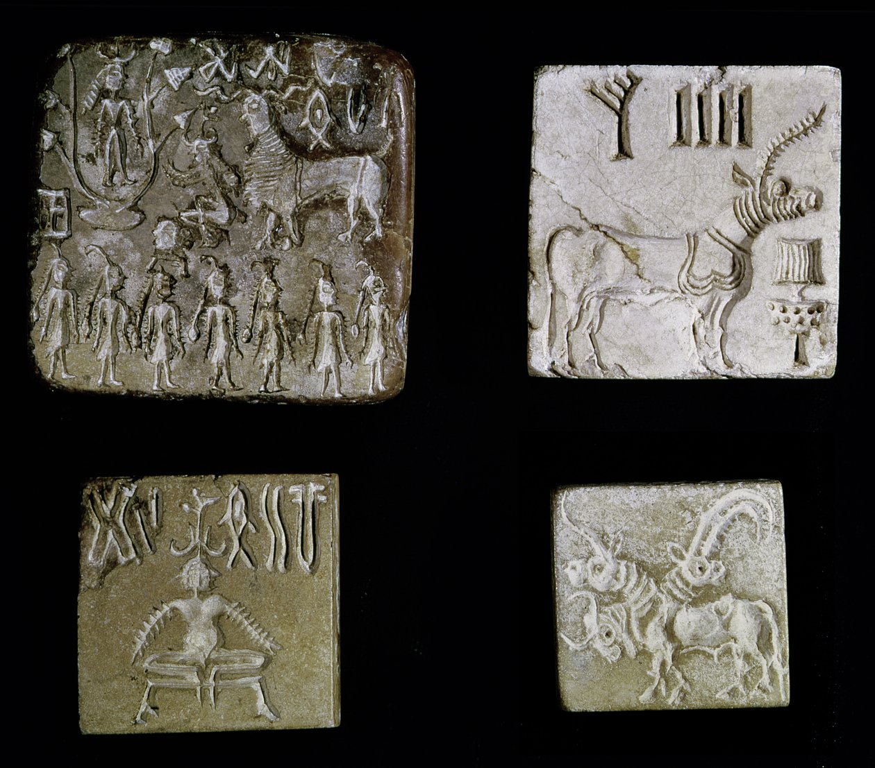 Vier zegels die mythologische dieren afbeelden, uit Mohenjo-Daro, Indusvallei, Pakistan, 3000-1500 v.Chr. door Harappan