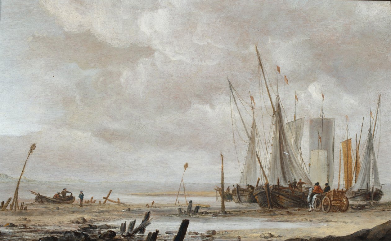 Een strandtafereel met opgestelde vissersboten door Hendrick Dubbels