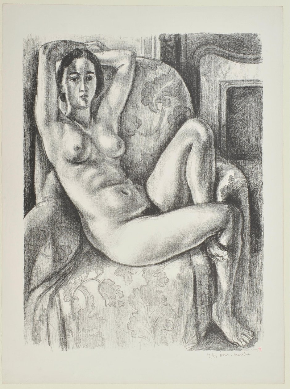 Naakt met blauw kussen naast een open haard door Henri Matisse