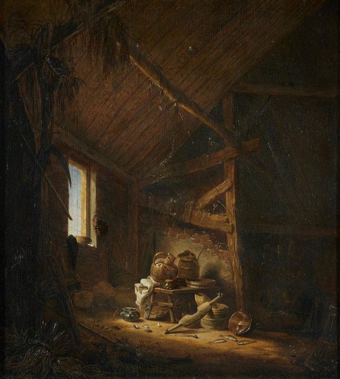Een interieur van een schuur met licht door een raam door Herman Saftleven