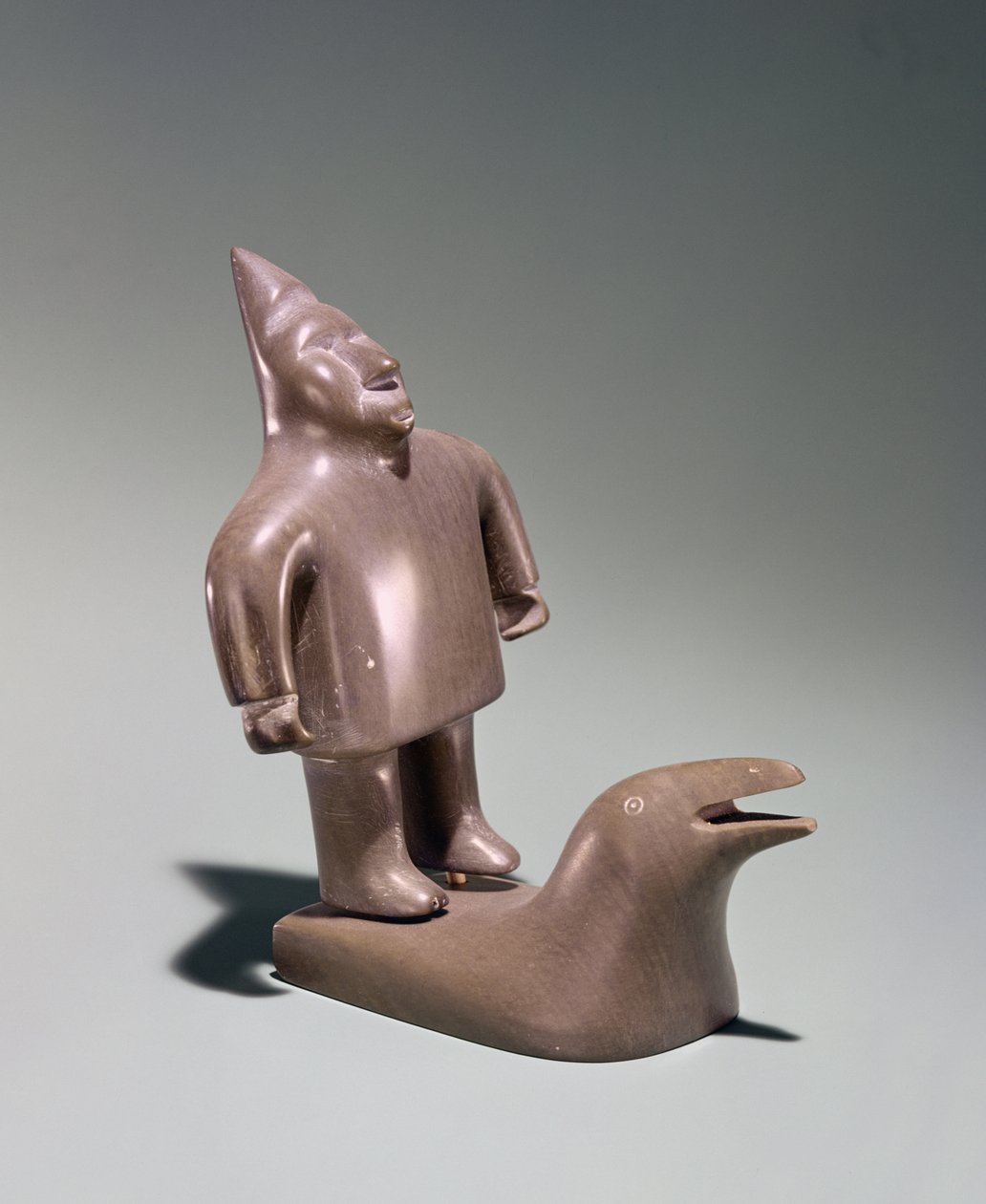 Mythologisch figuur staand op een walvis, van Cape Dorset door Inuit School