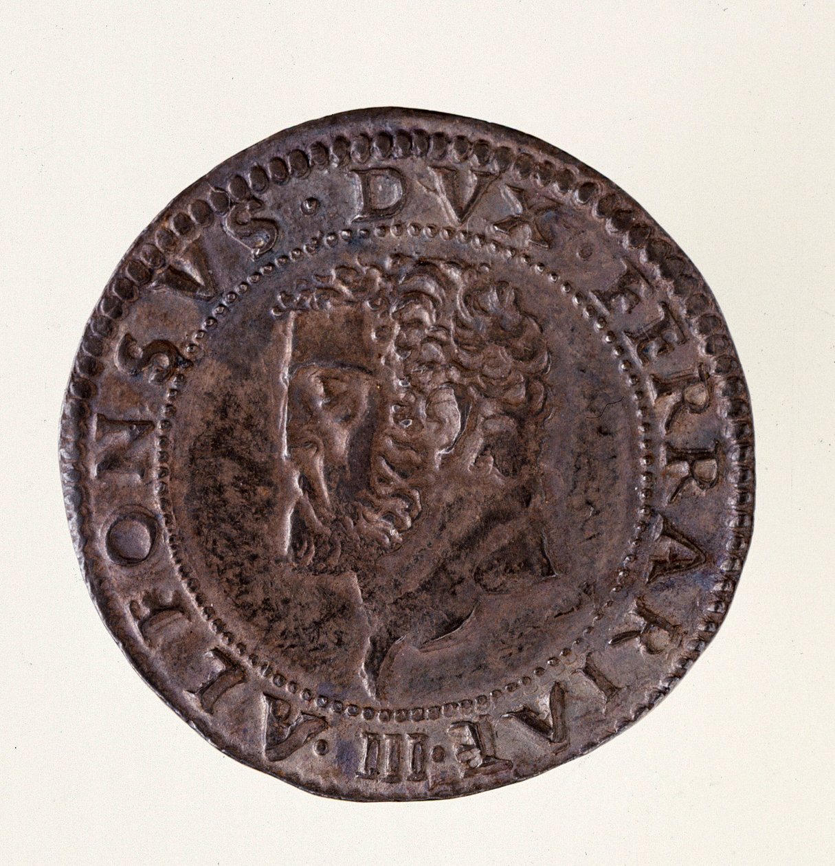 Zilveren munt (testone) uit Ferrara: regering van hertog Alfonso II d