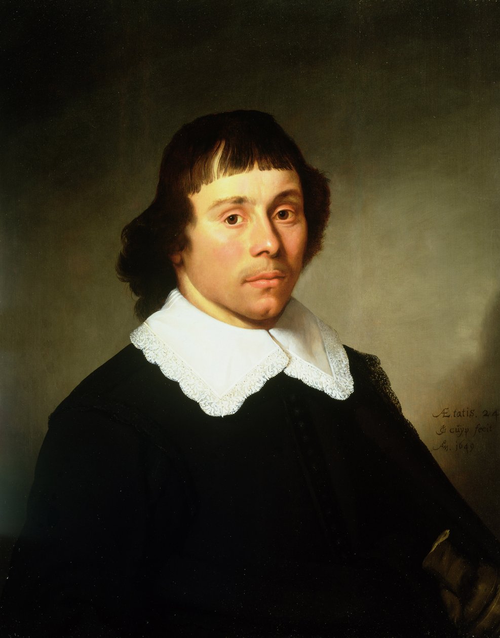Portret van een jonge man, in een zwart kostuum met een witte kanten kraag door Jacob Gerritsz Cuyp