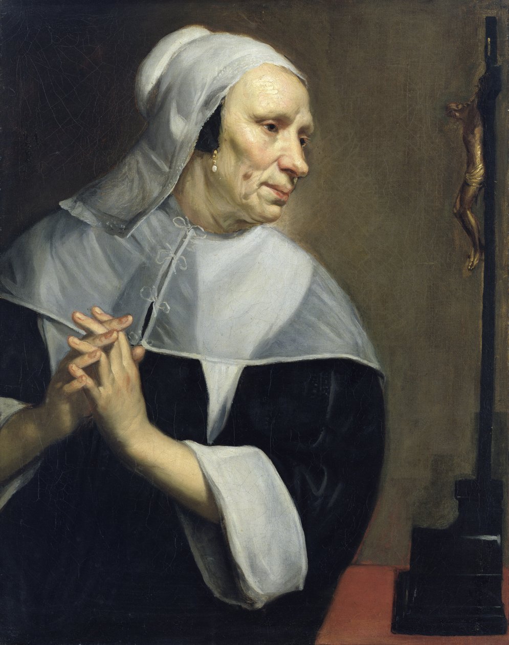 Oude vrouw die bidt door Jacob van Oost