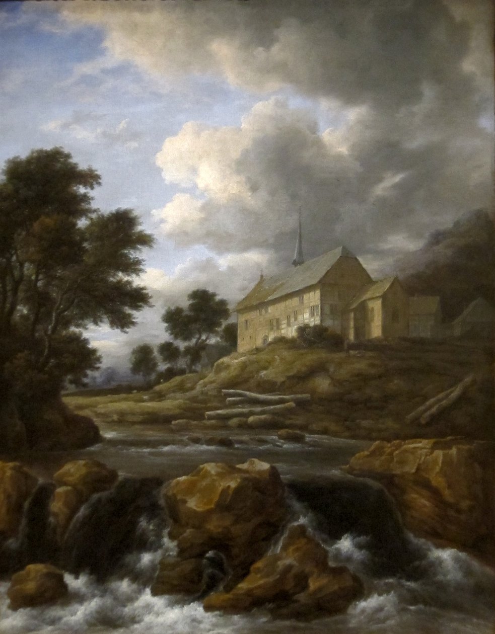 Landschap met een kerk bij een rivier door Jacob van Ruisdael