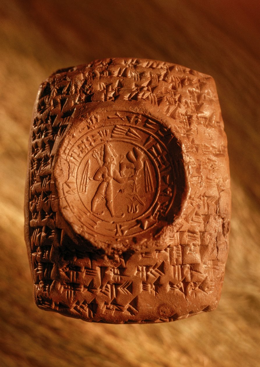 Bij opgraving werd dit zegel uit Ugarit ontdekt met spijkerschrift en figuren door James L Stanfield