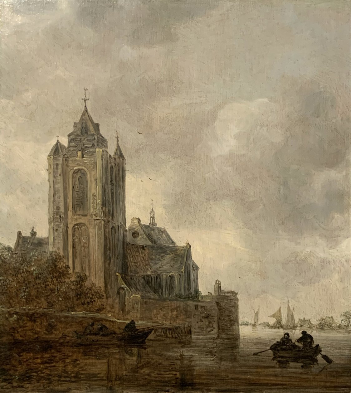 Een kerk aan de oever van een rivier. door Jan van Goyen