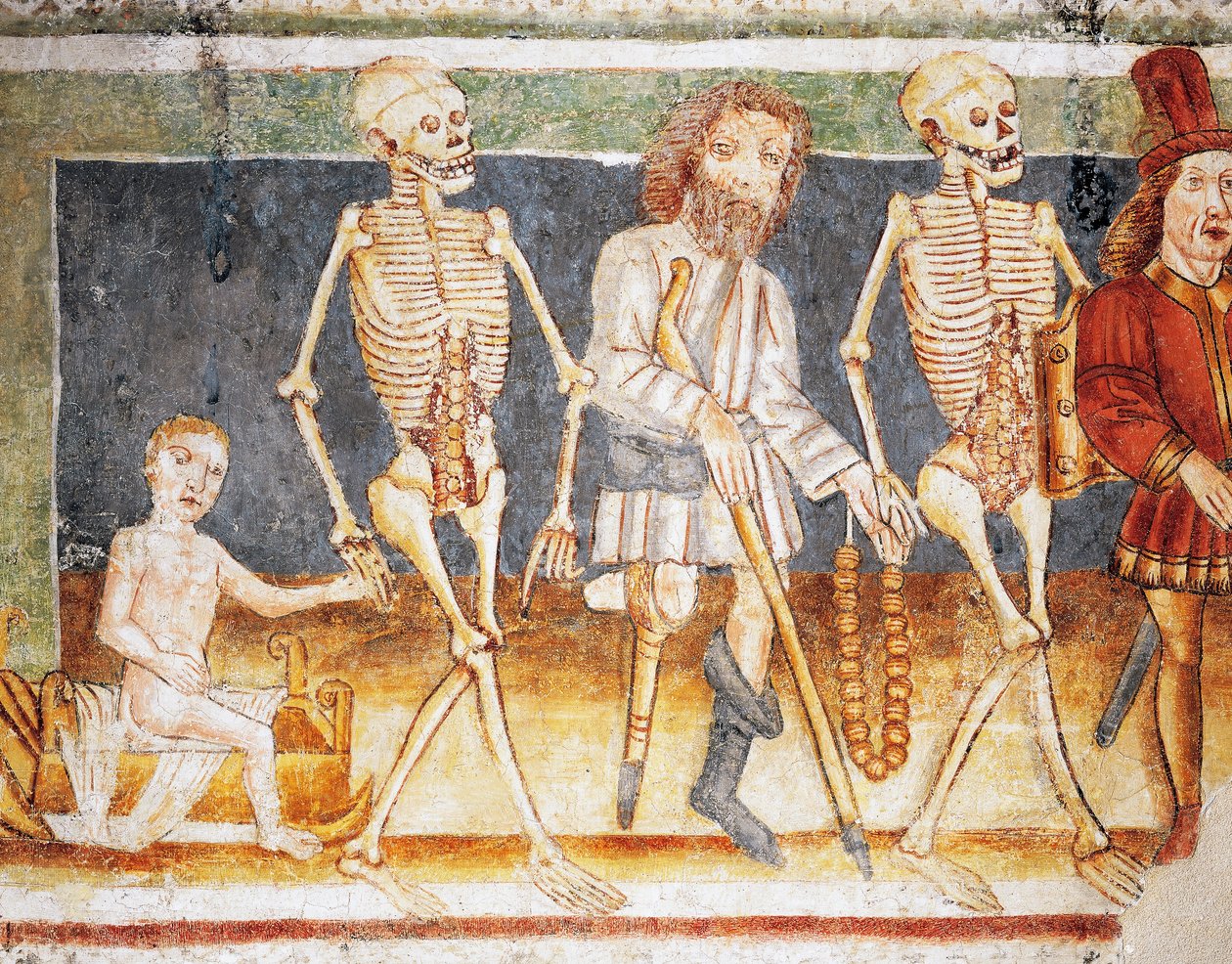 Hrastovlje versterkte kerk, Drievuldigheidskerk, Dood vergezelt kind en arme, Dodendans (1490), (detail) uit fresco
