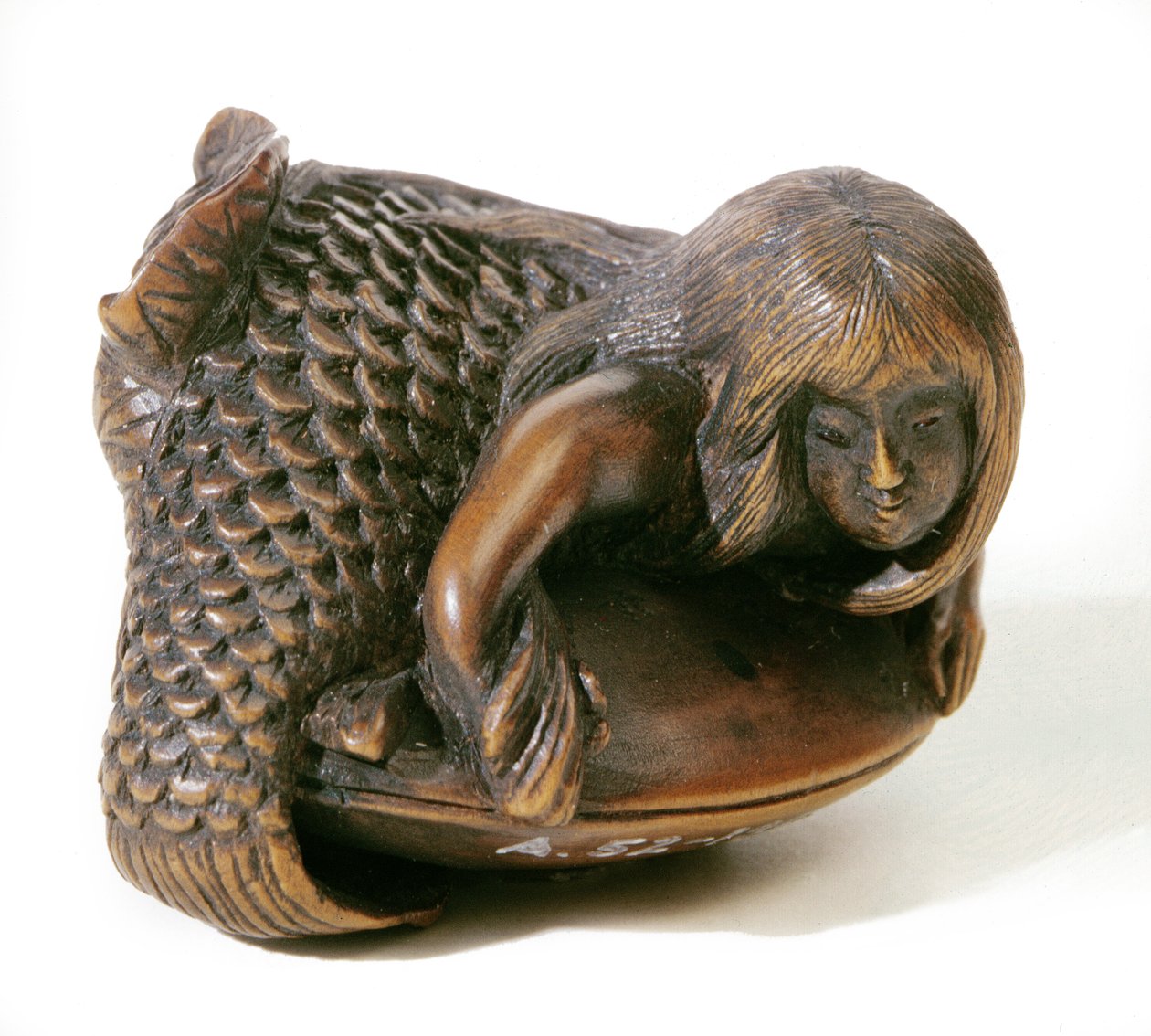 Netsuke gesneden in de vorm van een zeemeermin door Japanese School