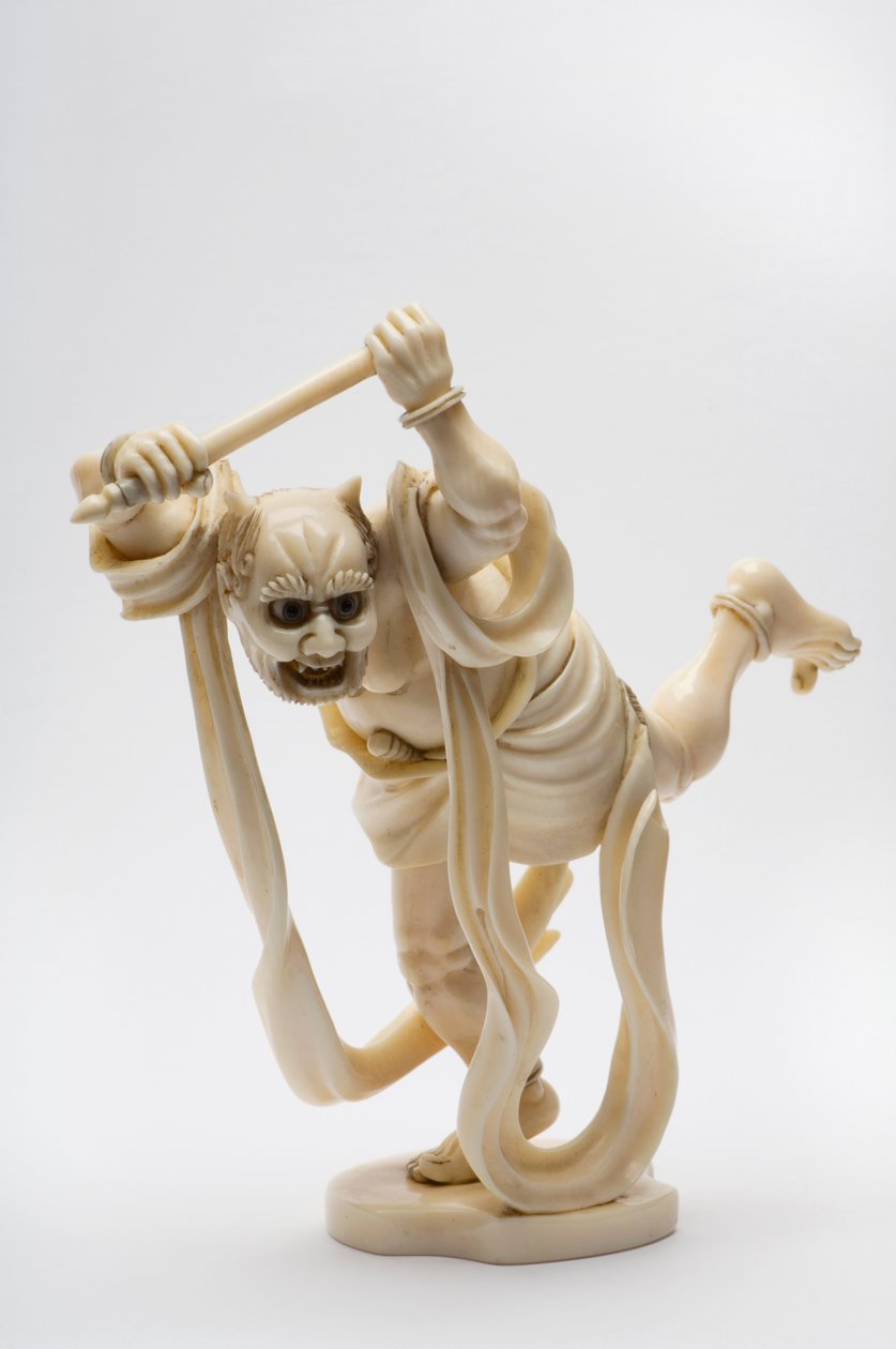 Okimono in de vorm van een demon met een stok door Japanese School