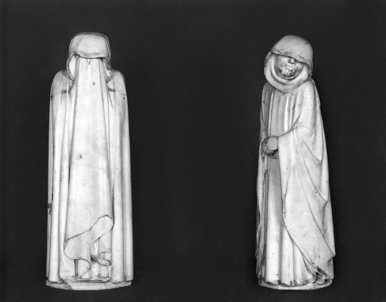 Twee rouwenden, uit het graf van Hertog Jan van Berry voor 1438