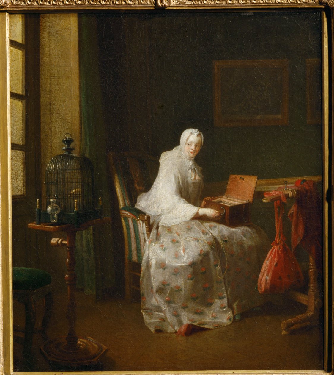 La serinette, dit aussi Dame variant ses amusements - een serinette is een klein mechanisch orgel dat wordt gebruikt om vogels te leren zingen ... door Jean Baptiste Simeon Chardin