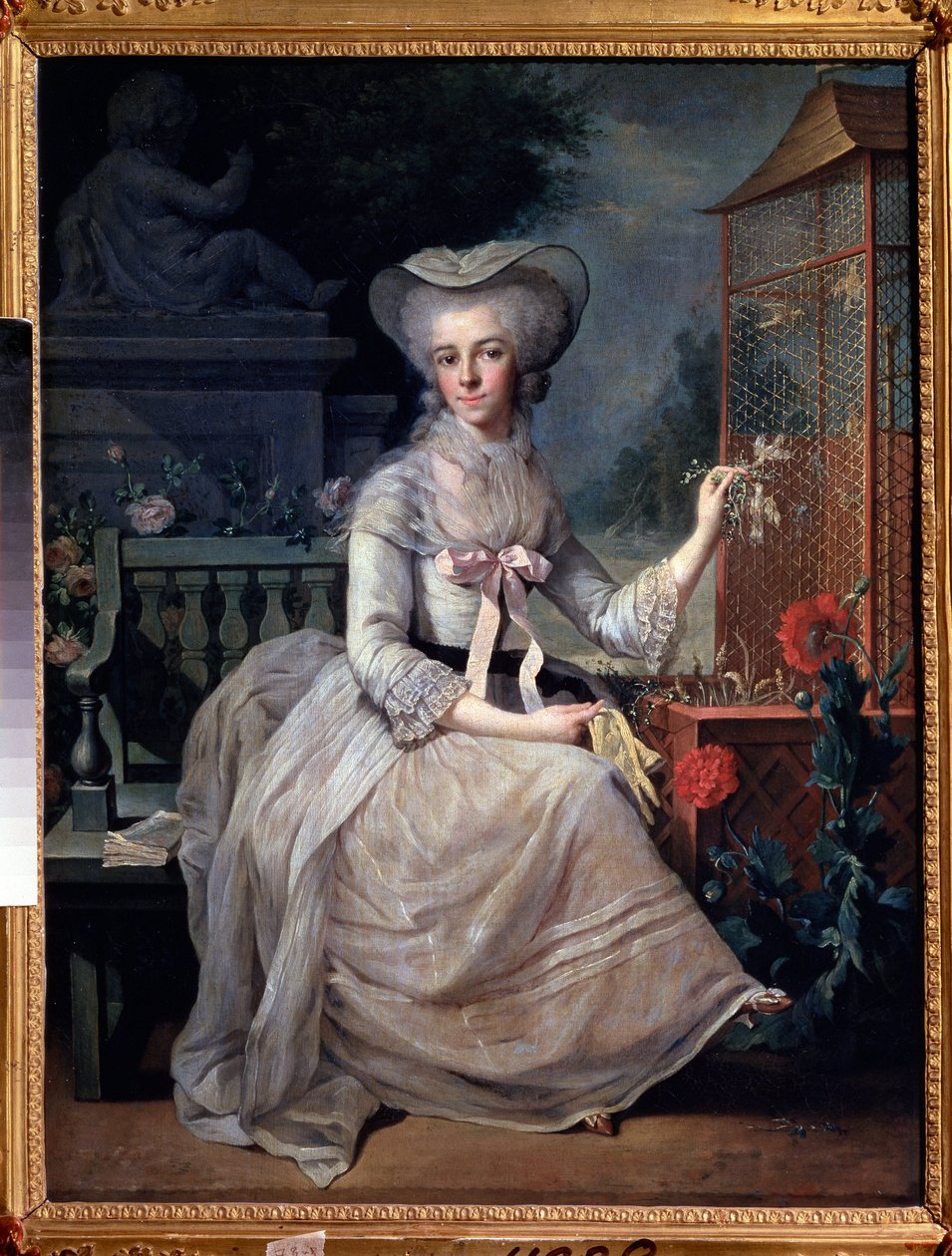 De jonge dame bij de kooi door Jean Baptiste Charpentier
