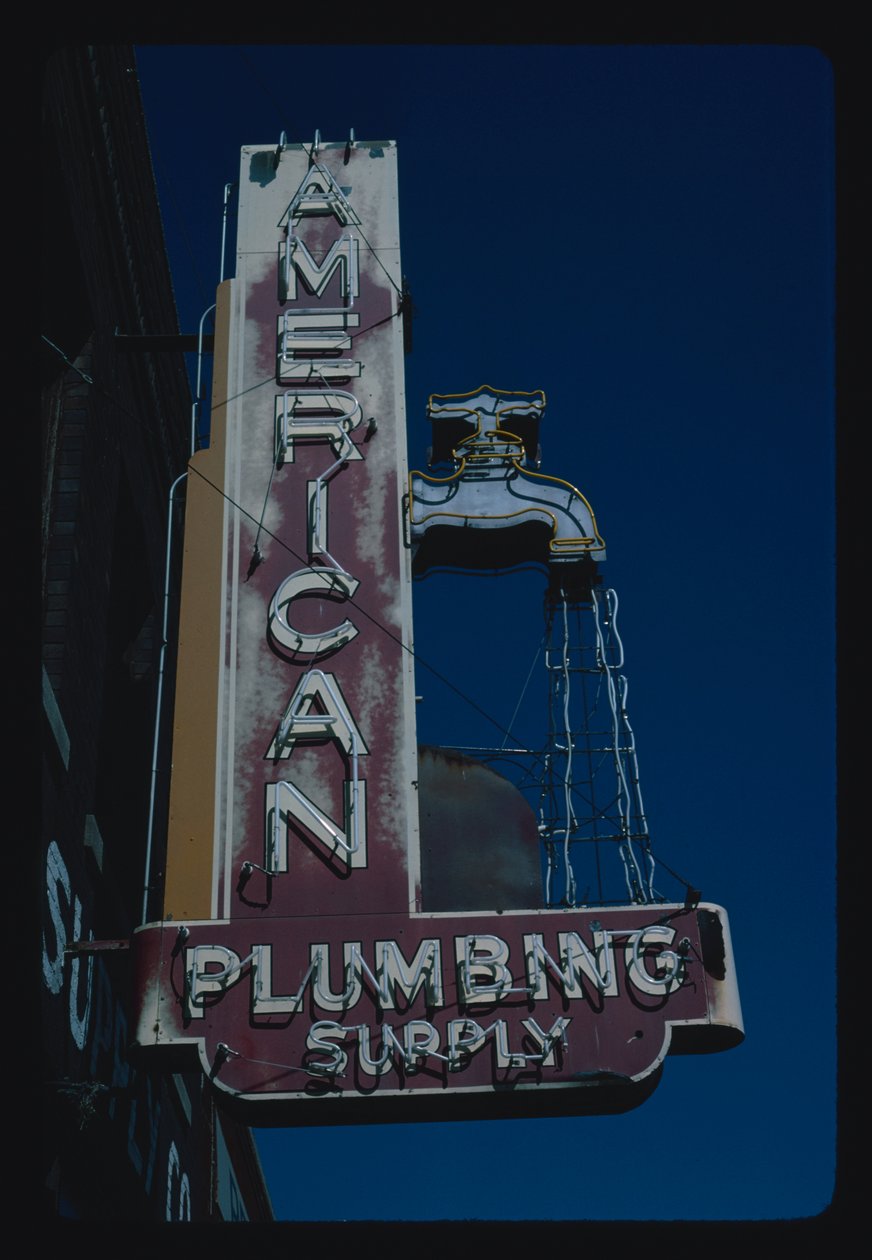 American Plumbing Supply sign, Des Moines, Iowa, VS door John Margolies