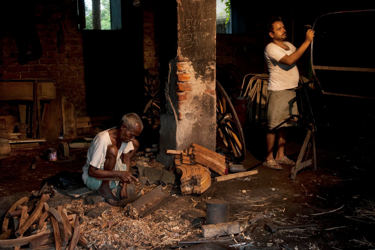 Riksjarijders, Kolkata, 2009 (foto) door Jon Nicholson