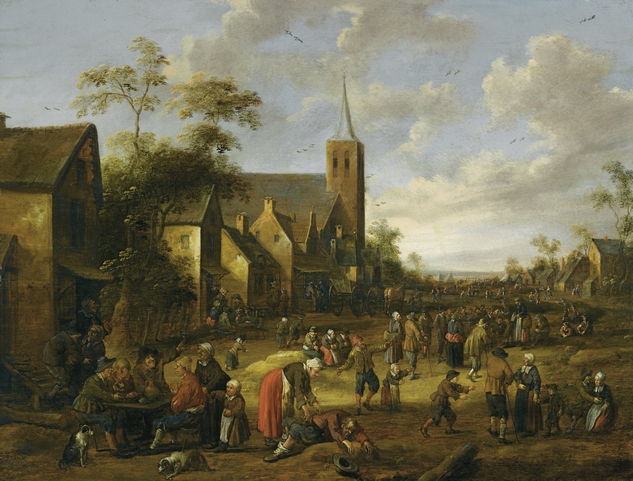 Een druk dorp met talrijke figuren, boeren die eten en drinken aan een tafel op de voorgrond, een kerktoren daarachter door Joost Cornelisz Droochsloot