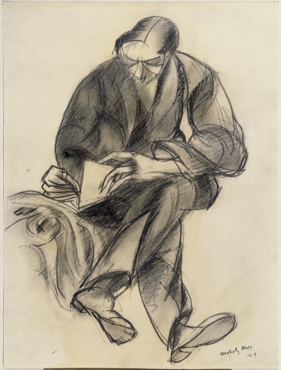 Zittende figuur die leest door Laszlo Moholy Nagy
