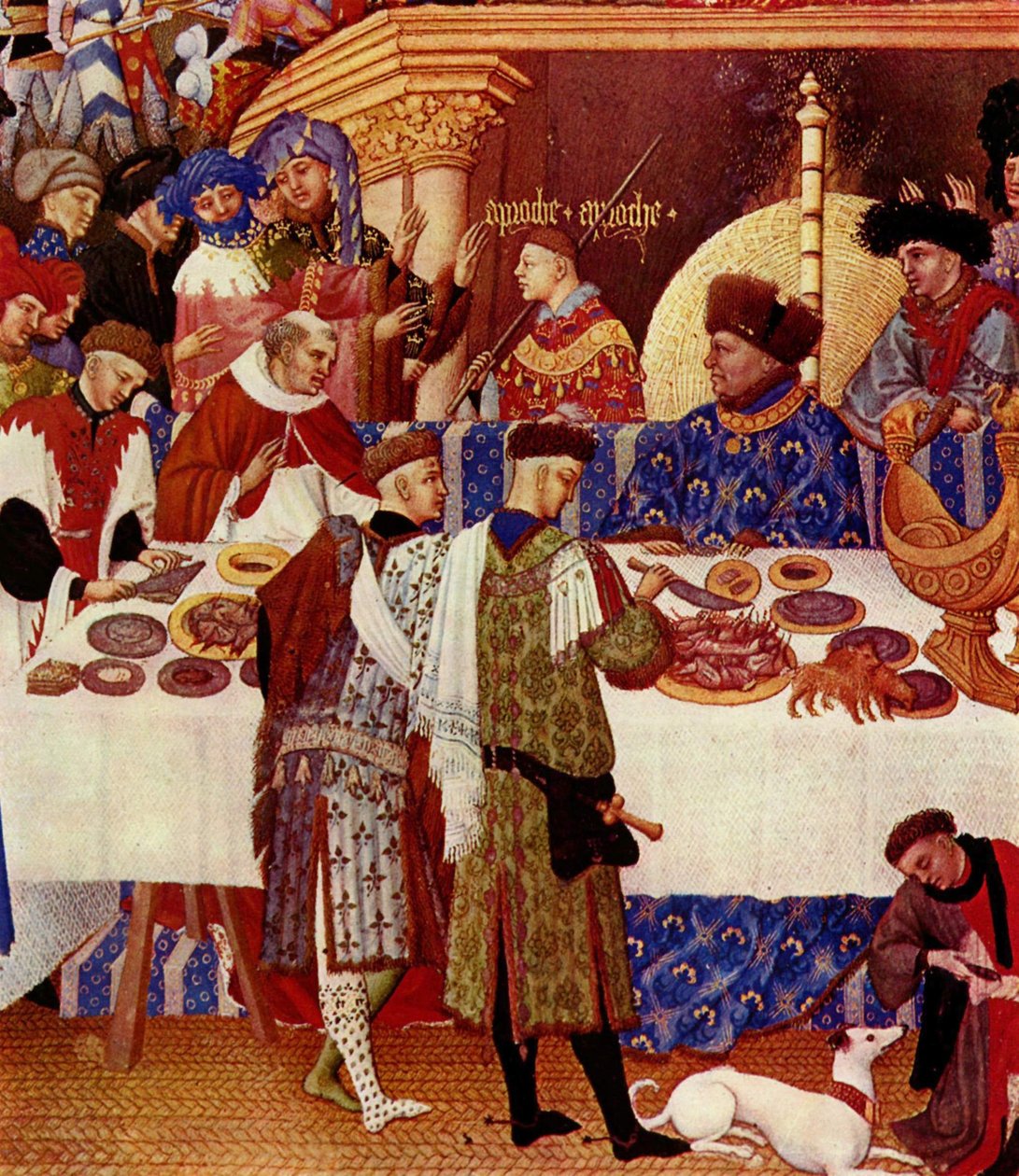 De Duc de Berry, rechtsonder zittend, met zijn rug naar het vuur, is in het blauw gekleed en draagt een bontmuts. Hij nodigt zijn familie en vrienden uit om zich aan hem voor te stellen. Achter hem staat het opschrift "Approach Approach". Verschillende vri door Limbourg Brothers