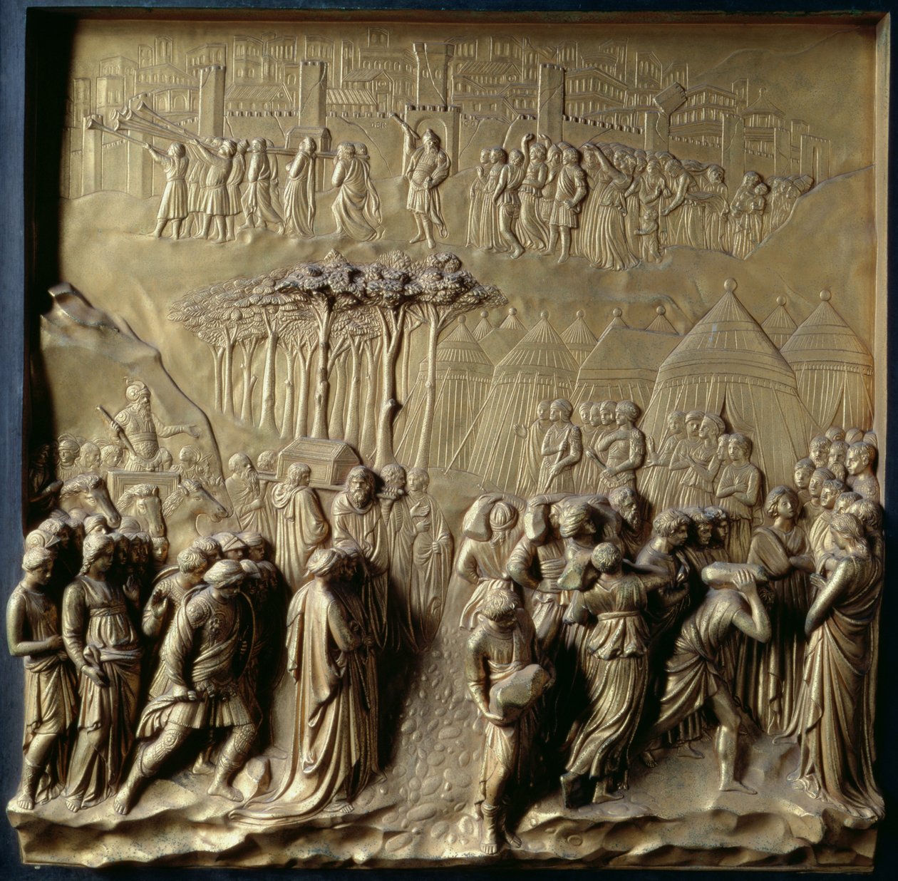Het verhaal van Jozua: Jozua instrueert de priesters om de Israëlieten over de Jordaan te leiden en de val van Jericho, een van de tien reliëfpanelen van de Poorten van het Paradijs (Oostdeuren), 1425-52 door Lorenzo Ghiberti