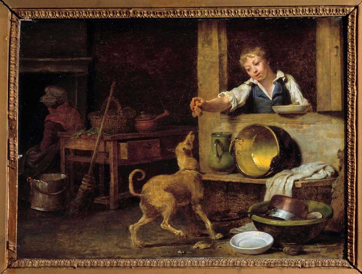 Keukeninterieur Een jonge dienaar geeft de hond de restjes. Schilderij door Martin Drolling (1752-1817) 19e eeuw Orléans, Museum voor Schone Kunsten door Martin Drölling