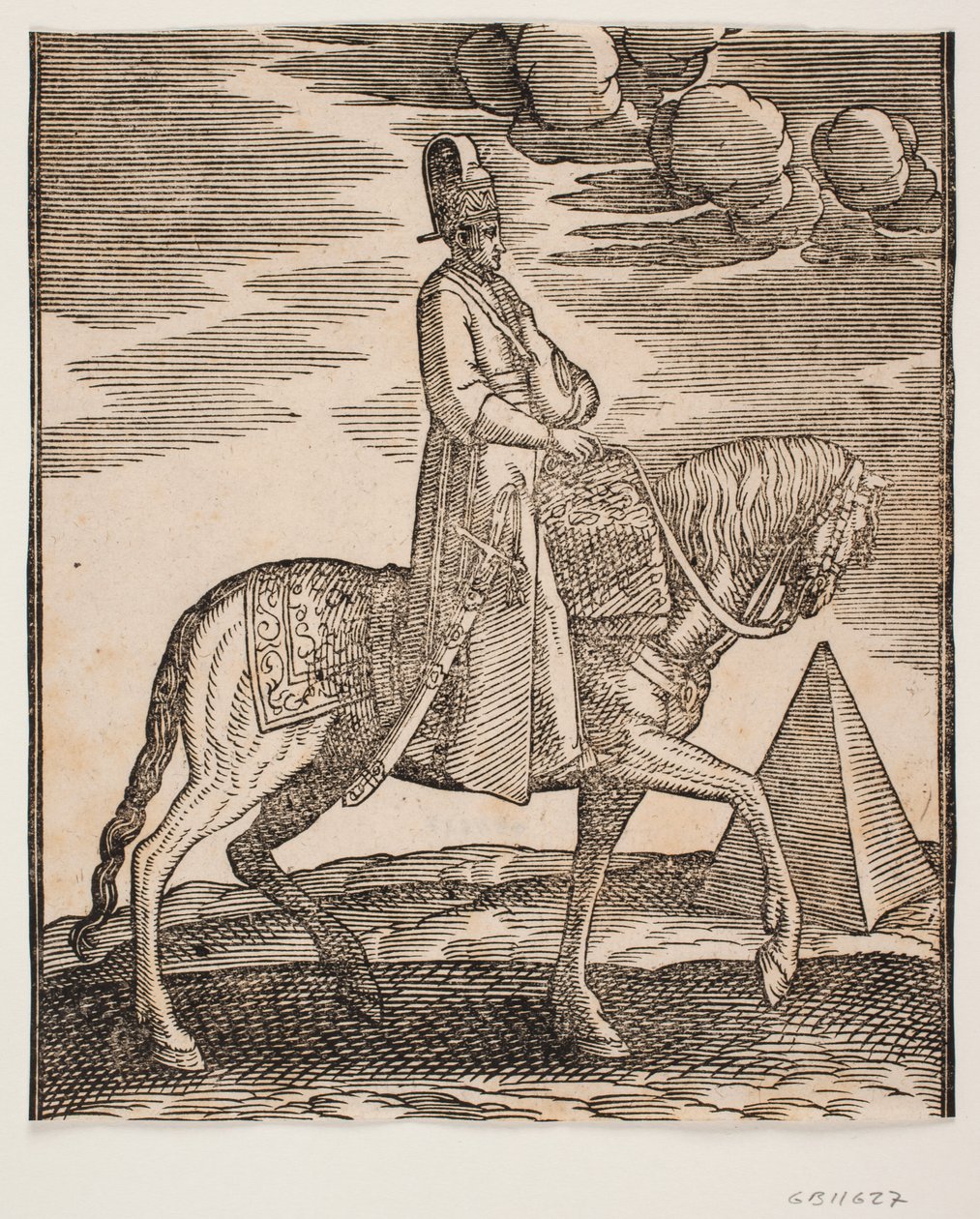 Ruiter met een fles om zijn nek, profiel naar rechts; een zwaard aan zijn rechterzijde en bagage voor hem, gedrapeerd over het zadel; rechts, op de achtergrond, een piramide door Melchior Lorck